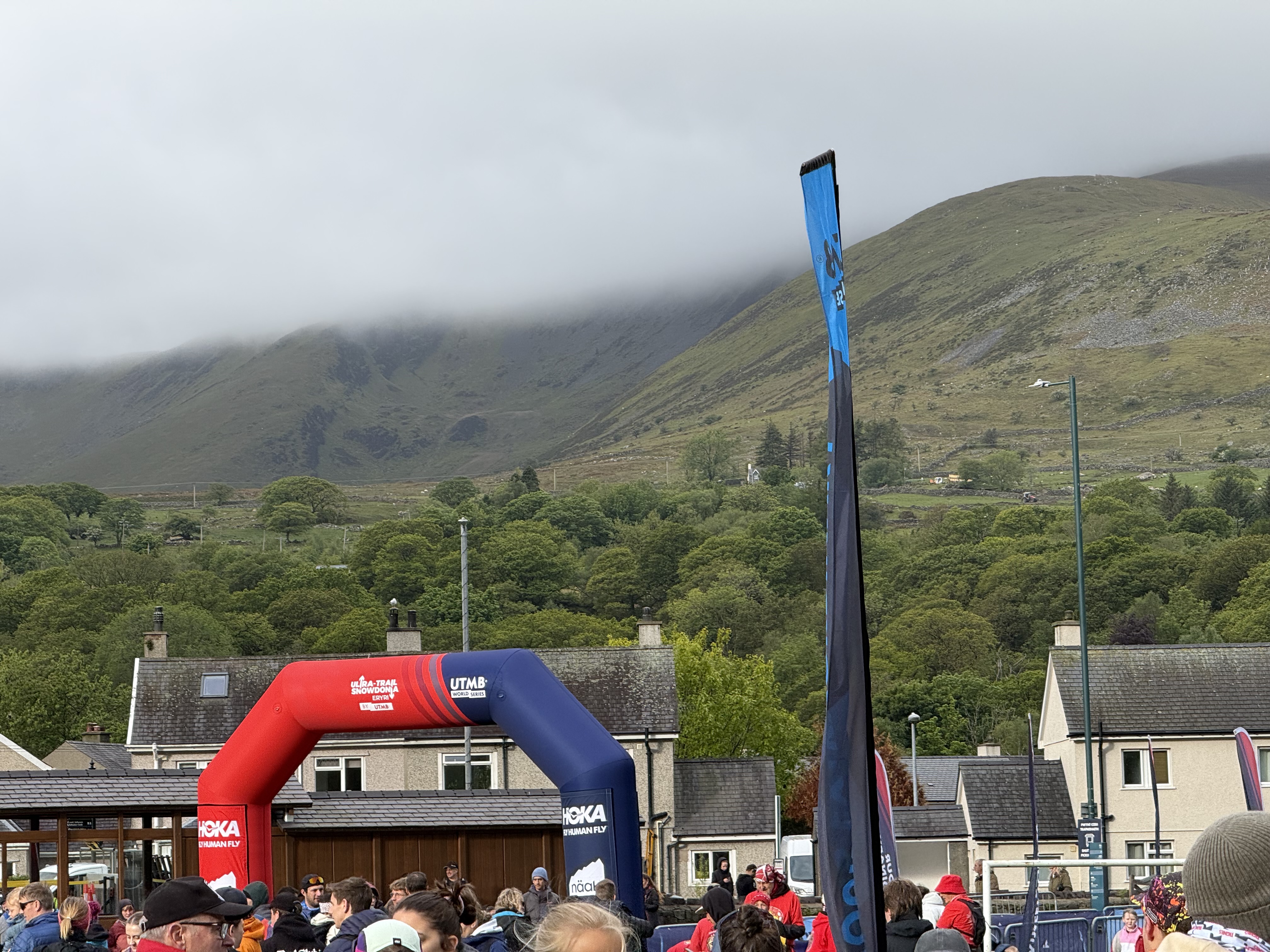 The UTMB Snowdonia start area in Llanberis, mist sitting low on the mountains